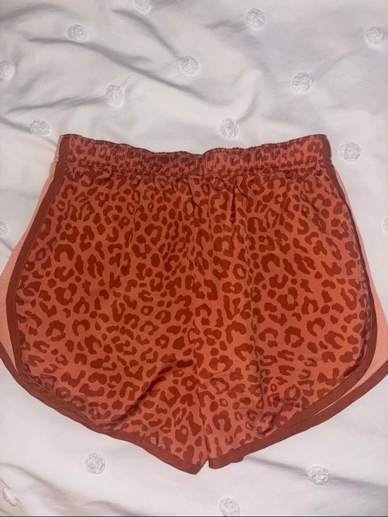 Nike Women’s Orange Leopard Print Running Shorts - Picture 3 of 3
